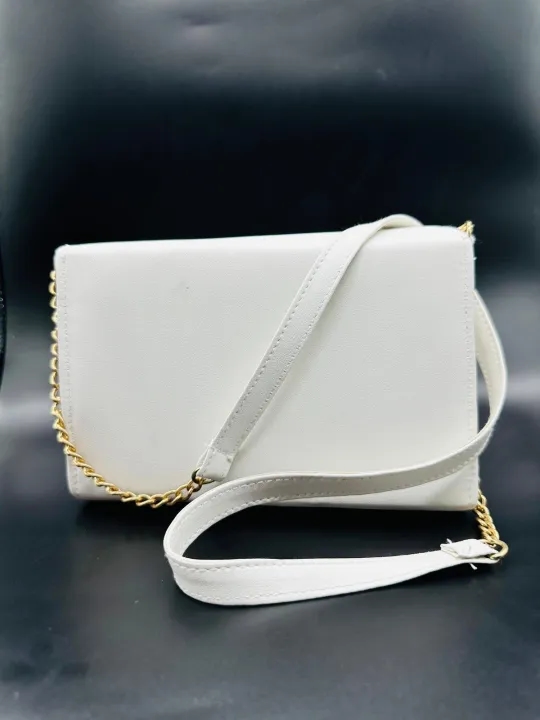 white coloured strap bag 3