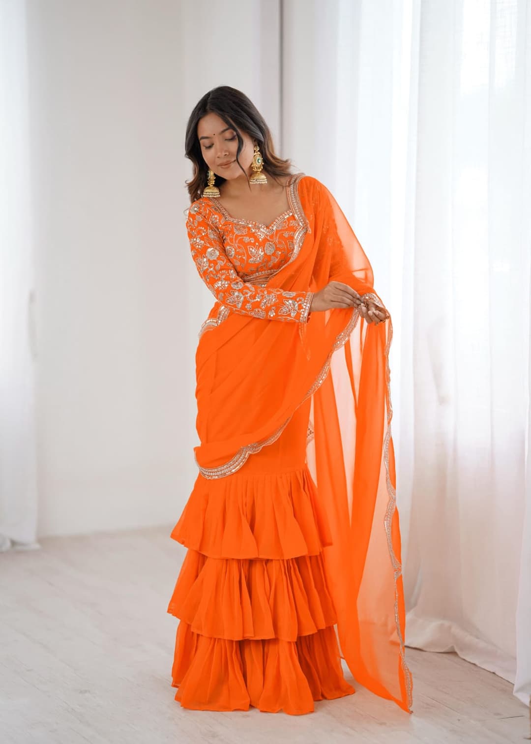 Women's Faux Georgette Ruffle Saree With Unstitched Blouse Piece