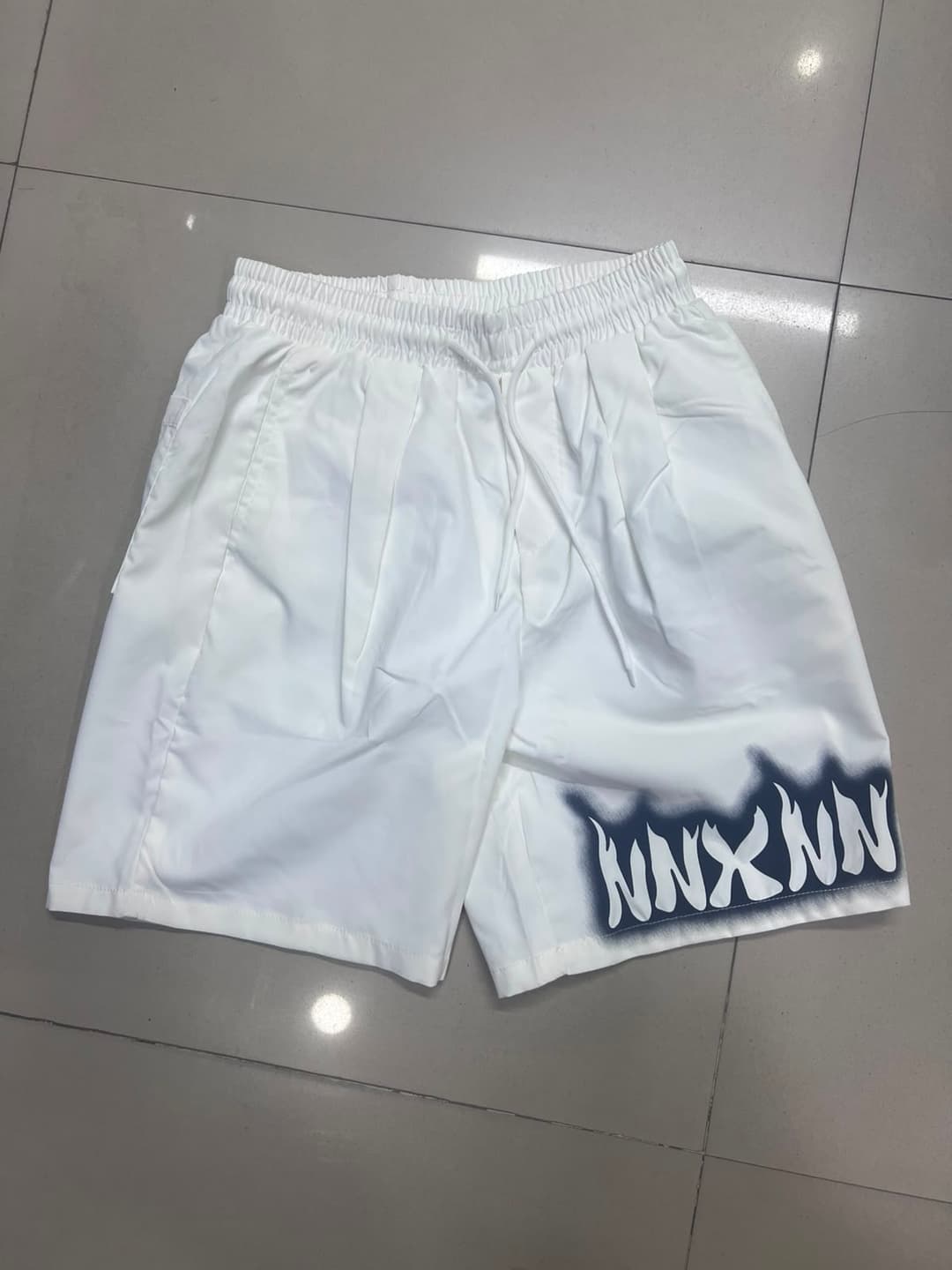 Casual Men's Mid-Length Beige Shorts with Snap Side Design