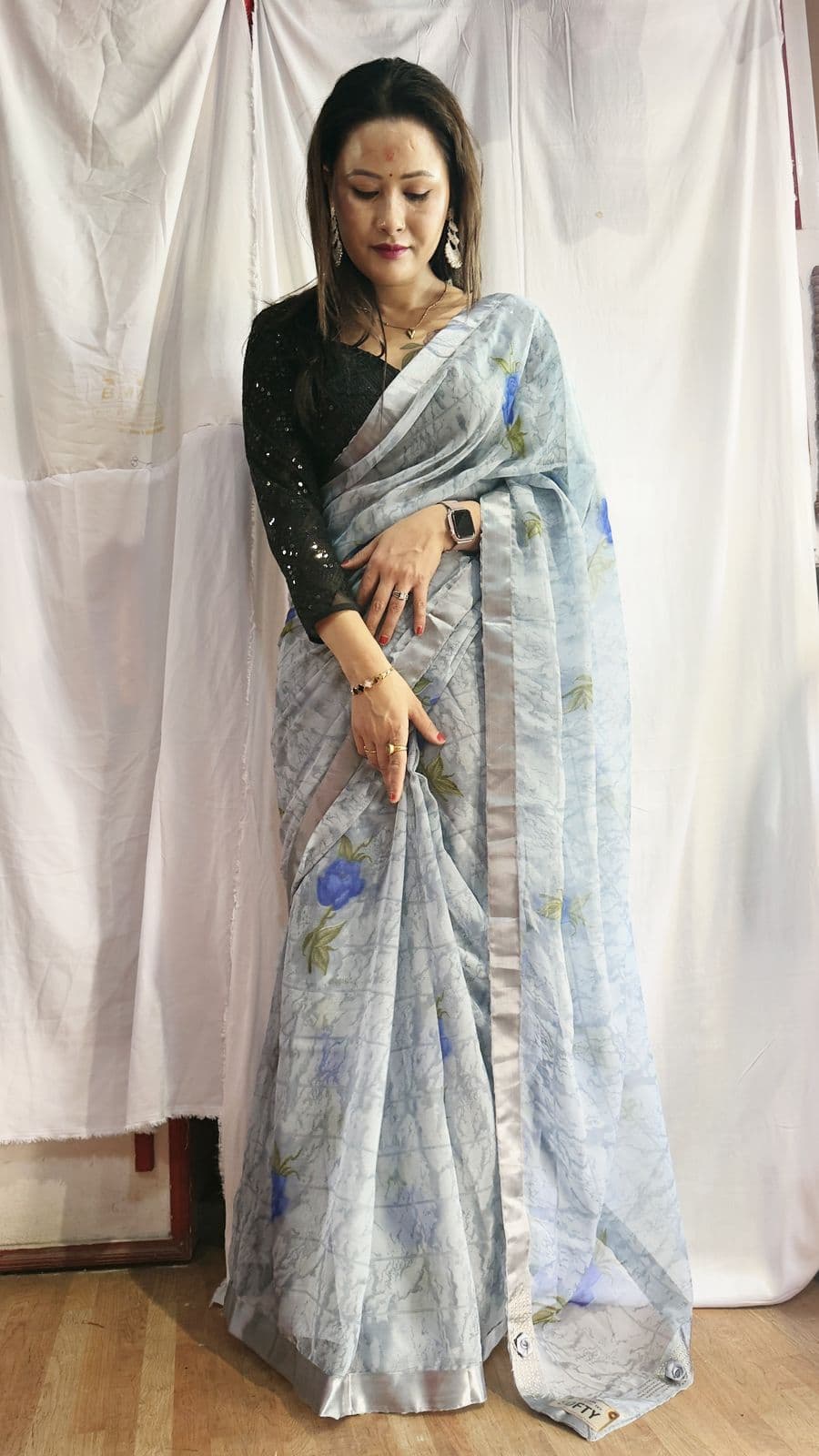 Menuka Saree Checked Poly Georgette Designer Saree