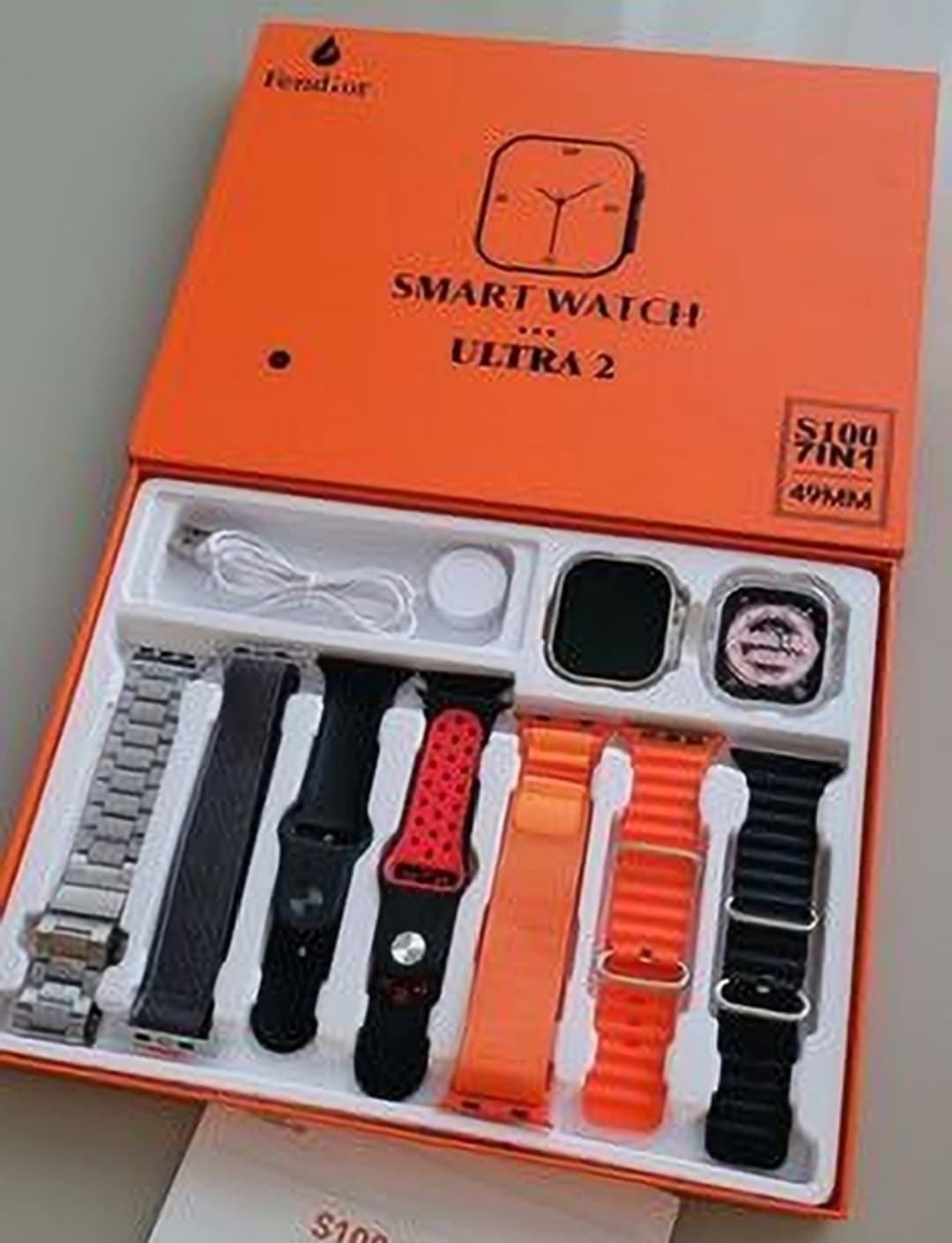 the ultimate Smart Watch Ultra 2 bundle with 7 stylish straps, 1 watch, and a wireless charger – perfect for style and convenience! 1
