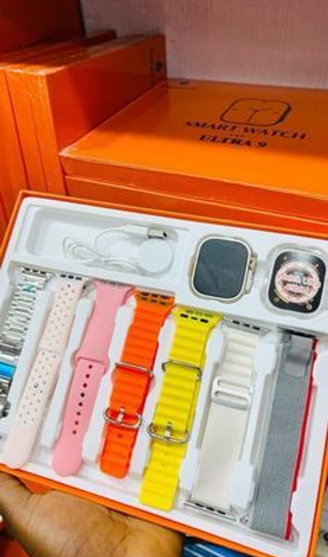 the ultimate Smart Watch Ultra 2 bundle with 7 stylish straps, 1 watch, and a wireless charger – perfect for style and convenience! 2
